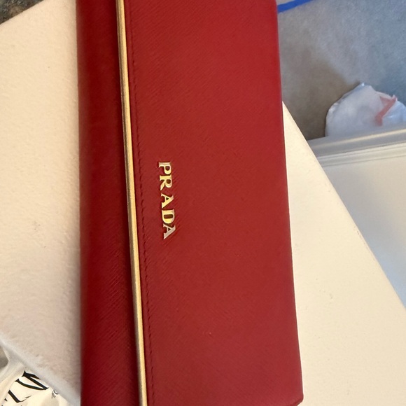 Prada Other - Prada Red Saffiano Leather Clutch with Gold Logo